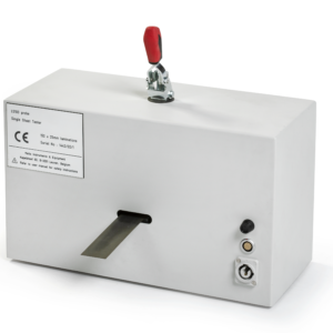 HyMAC soft magnetic materials tester shown in a clean lab setting, featuring a compact instrument with connected fixtures used to measure magnetic properties across a wide frequency range.